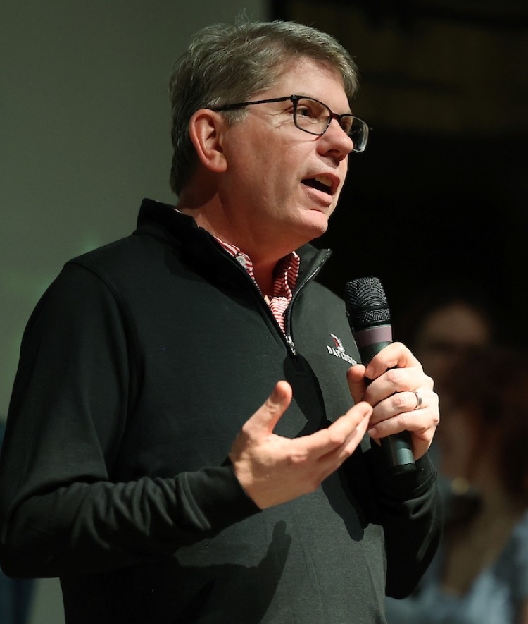 President Doug Hicks speaking to students