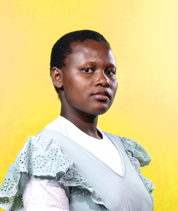 a young Black woman on a yellow background