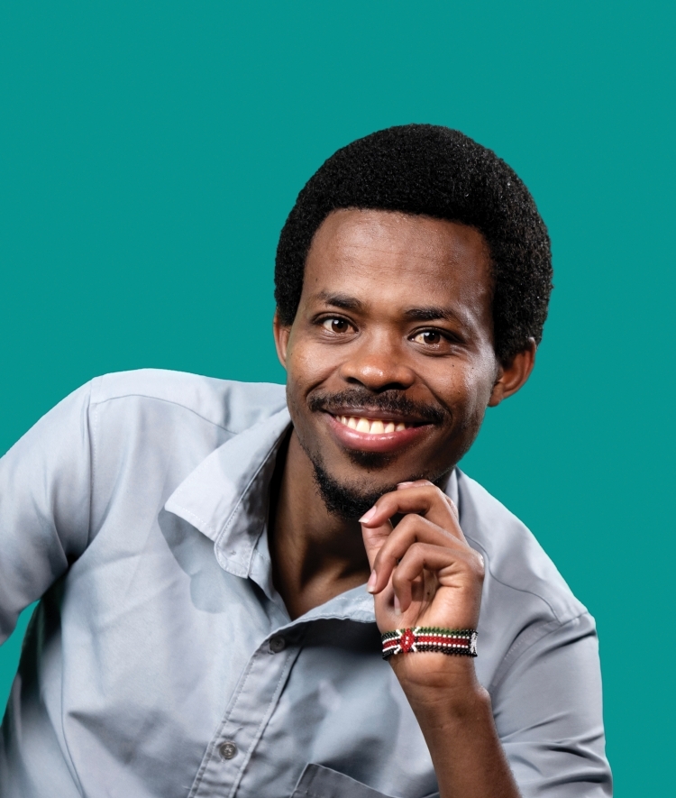 a young Black man wearing a collared shirt