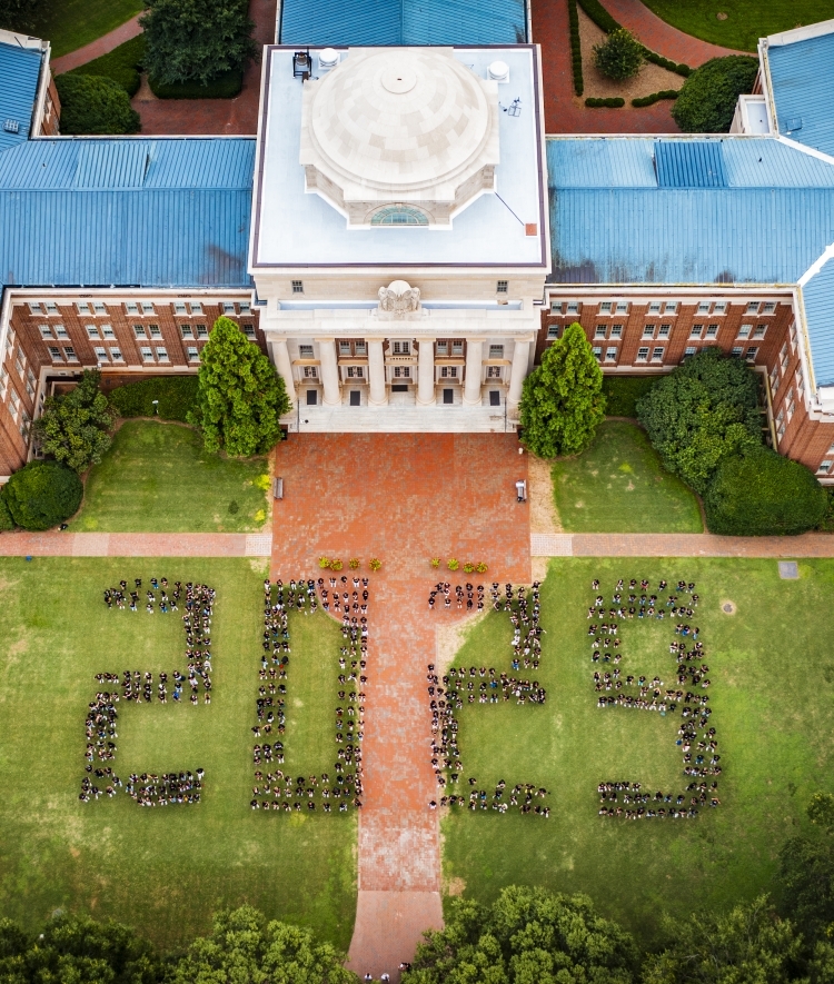 an aerial view of students in the shape of "2029"