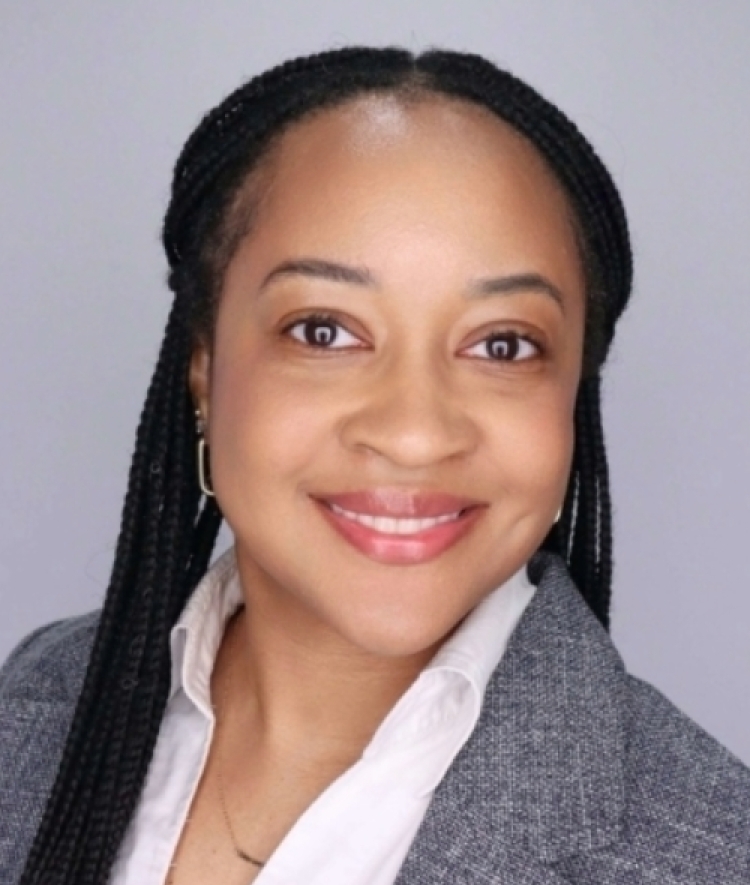 a woman wearing a jacket and collared shirt over a grey background