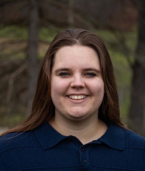 a young white woman with brown hair