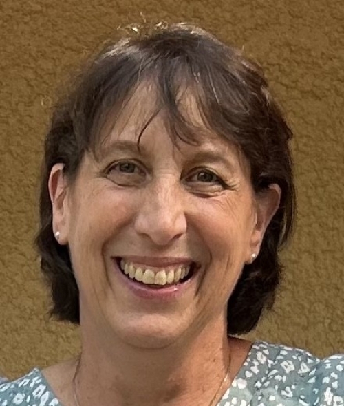 a middle aged white woman with short brown hair