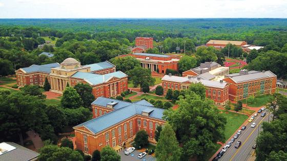 Aerial of Davidson College campus showing lots of campus buildings and trees