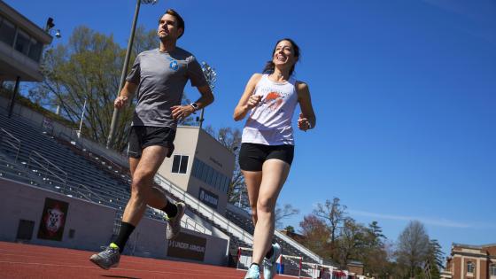 Two physics professors run on the track