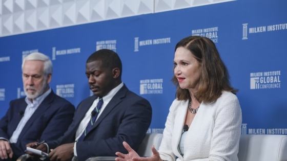 Carol Quillen and other leaders sit at panel