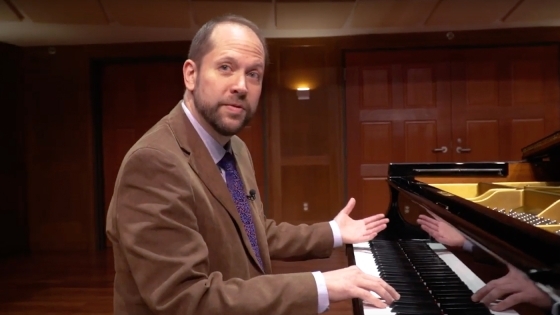 Neil Lerner playing music on the piano