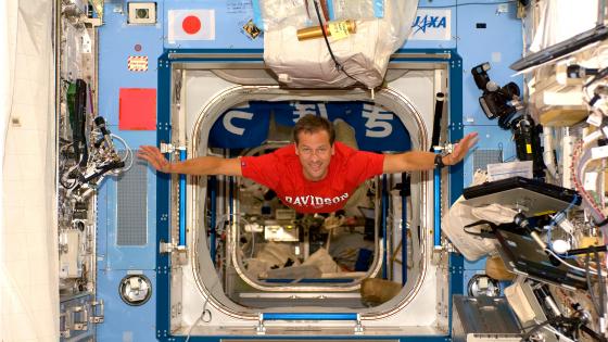 Tom Marshburn in spaceship with Davidson t-shirt on