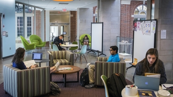 Students studying in Wall academic building