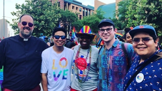 Liam Barr in group of friends at pride parade