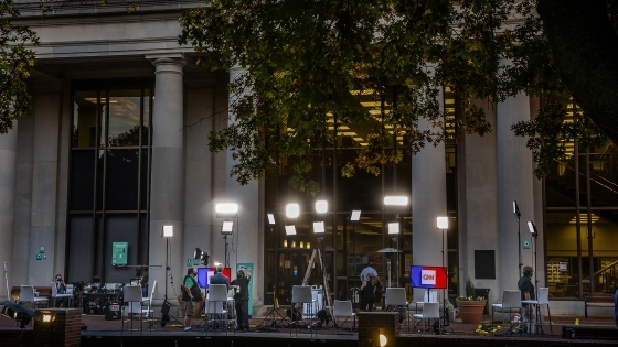 Library front with CNN monitors and recording crew and equipment