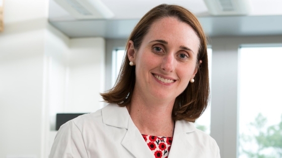 Sallie Permar in lab coat