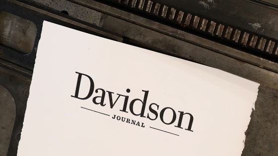 Paper with the "Davidson Journal" wordmark printed on it atop a letterpress