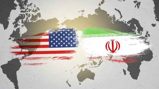 United States and Iran Flag over world map