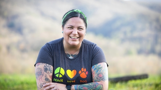 Dr. Blythe Wincester '99 in front of NC Mountain Landscape