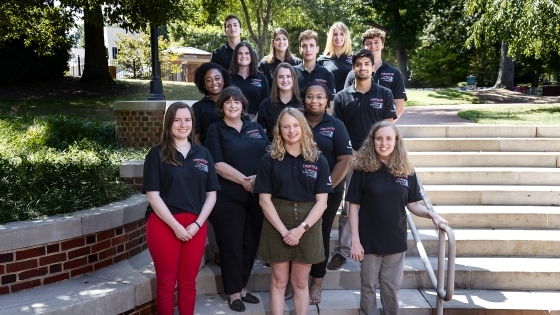 College advising corps employees gather for a group shot outside