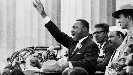 Dr. Martin Luther King Jr. delivering speech to crowd