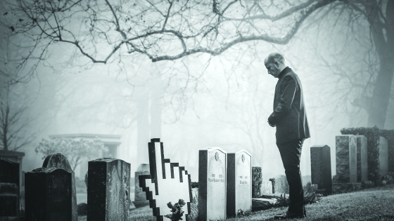 Death in the digital age image of man looking at graveyard