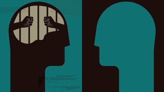 Image of two people facing each other in contrasting colors. One person has a troubled mind.