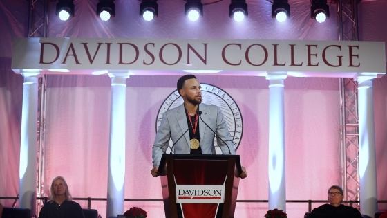 Steph Curry speaks at the podium during the Curry for 3 Event