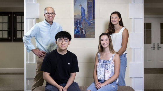 Biology Professor Dave Wessner with students David Peng '22 and Cathleen Krabak '23 (seated) and Nella Tsudis '23, surrounding “El Extranjero” by artist Delia Cugat.