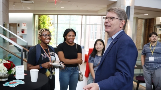 Students with President Doug Hicks 