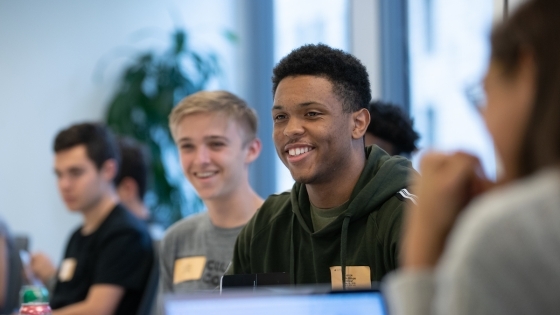 John Billups ’22 smiling in classroom