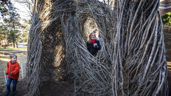 Eileen Keeley enjoying Common Ground sculpture