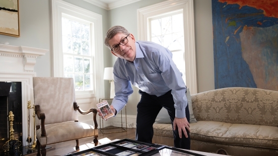 President Hicks shows off his baseball and basketball card collection