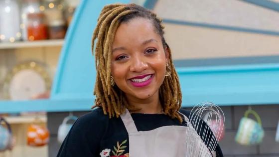 Karis Stucker '18 holding a whisk on the The Great American Baking Show