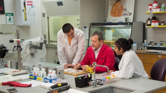 Julio Ramirez working in lab