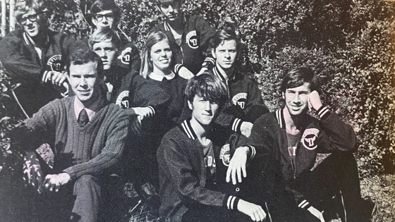 a group of cross country runners in a black and white 1970s photograph