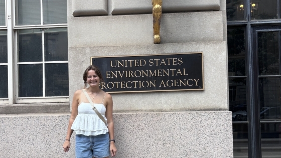geography environmental case study a young white woman stands in front of "US EPA" sign