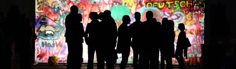 Students participate in a Berlin Wall Simulation