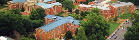 Aerial of Davidson College campus showing lots of campus buildings and trees