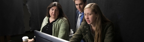 Prof. Cruz-Neira in Media Lab with students working on a virtual reality project