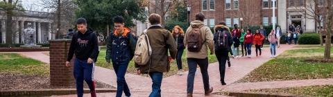 Students walking to class in Chambers building