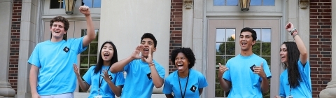 July Experience members at the steps of Chambers celebrating