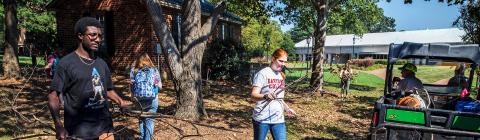 Campus cleanup where student help college landscaping after a hurricane