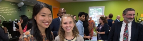 Two students pose for a photo at the Spencer Weinstein Center for Community and Justice Reception