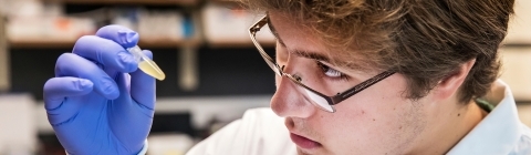 Student with test tube