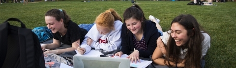 Students on Front Lawn w Computer Warm Day