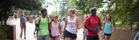 Group of student walk on campus