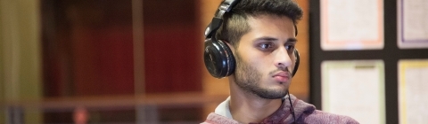 Student studies with his laptops