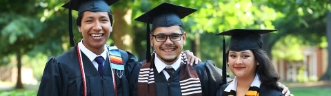 Charles Scholars pose in regalia