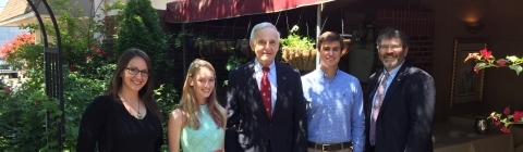 Bremmer poses with students and faculty from Davidson