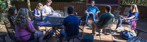 Prof. Keyne Cheshire leads class outside