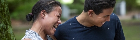 Student with Family Member Laughing