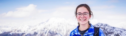 Catherine Cartier in front of mountain landscape