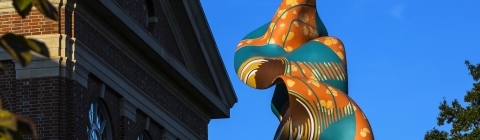 Shonibare Statue against the blue sky
